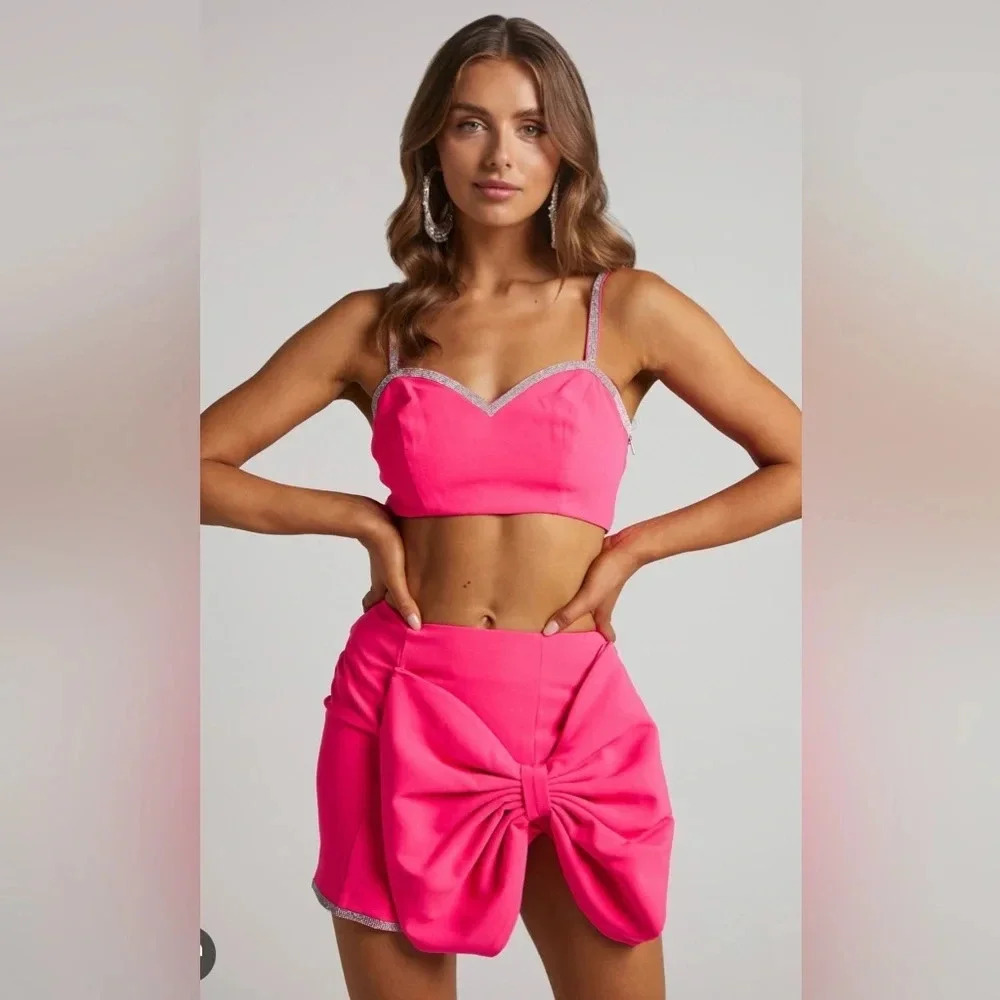Showpo KIMMAY MINI SKIRT - OVERSIZED BOW DIAMANTE TRIM SKIRT IN HOT PINK